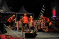 An arts and culture group is performing a percussion musical instrument (gimba) at the Palu City Cultural Festival.