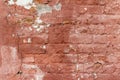 Artsy looking old salmon color painted brick wall texture with deterioration