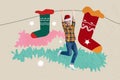 Artwork collage image of excited mini guy hands hold hang string big christmas socks decor isolated on creative