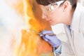 Artwork conservator at work Royalty Free Stock Photo