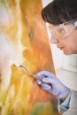 Artwork conservator at work Royalty Free Stock Photo