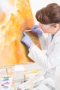 Artwork conservator at work Royalty Free Stock Photo