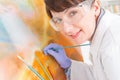Artwork conservator at work Royalty Free Stock Photo