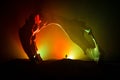 Artwork decoration with animal bone. Silhouette in an underground abandoned crypt. man standing in front of a cave entrance Royalty Free Stock Photo