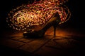 Artwork decoration. Silhouette of a high heel women shoes at dark. Women power or women domination concept Royalty Free Stock Photo