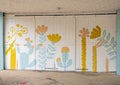 Artwork painted on sliding wooden doors of the Mosaic Makers Collective in the Bishop Arts District of Oak Cliff in Dallas, Texas. Royalty Free Stock Photo