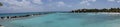 Aruba, Renaissance Island, Caribbean Sea. Sunny beach with white sand, coconut palm trees and turquoise sea. Summer vacation,
