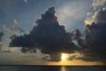 Aruba sunset with billowing clouds, light, and sea Royalty Free Stock Photo