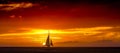 Aruba Sunset Katarmaran Sailing Past The Sun Royalty Free Stock Photo