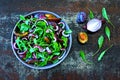 Arugula plum salad. The concept of proper nutrition.