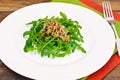 Arugula Salad with Germinated Grain in White Plate Royalty Free Stock Photo