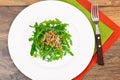 Arugula Salad with Germinated Grain in White Plate Royalty Free Stock Photo