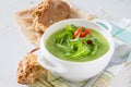 Arugula and tomatoes puree soup in white bowl Royalty Free Stock Photo