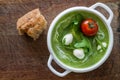 Arugula and tomatoes puree soup in white bowl Royalty Free Stock Photo