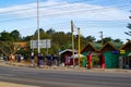 Arusha, Tanzania; 06/08/2019: African young students walking in the streets and crossing the road in Arusha, Tanzania