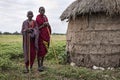 Arusha, Tanzania on 1st June 2019. Group of masai people in front of threre traditional house