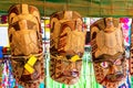 ARUTANGA, AITUTAKI, COOK ISLAND - SEPTEMBER 30, 2018: Wooden masks in the local market. With selective focus