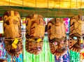 ARUTANGA, AITUTAKI, COOK ISLAND - SEPTEMBER 30, 2018: Wooden masks in the local market. With selective focus