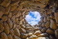 Arzachena, Sardinia, Italy - Archeological ruins of Nuragic complex La Prisgiona - Nuraghe La Prisgiona - with interior of stone