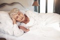 As blissful as nap time should be. a senior woman sleeping in bed in a nursing home. Royalty Free Stock Photo