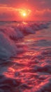 Sunset over the ocean, foamy waves of the ocean glow under the pink hues of sunset, with the sun low on the horizon casting a warm Royalty Free Stock Photo