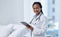 As a doctor, youve got to know your stuff well. Portrait of a young doctor using a digital tablet in a hospital. Royalty Free Stock Photo