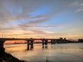 a bridge over a body of water sunshine river beutifull evening river side and blue sky amazing in the river Royalty Free Stock Photo