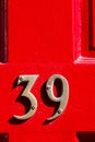 39 as a house number with strong shadows