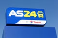 AS24 logo on a gas station