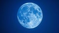 As the moon reaches its fullest and brightest form it creates a breathtaking contrast against the deep rich blue of the