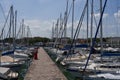 Desenzano del Garda, Italy - July 12, 2022 - yachts and boats docked at the port on Lake Garda on a sunny summer morning