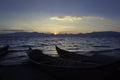 Lake scenery, sunset, fishing boat dock Royalty Free Stock Photo