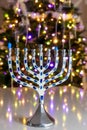 As part of Hanukkah traditions, menorah is lit with nine candles.