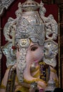 Close up portrait view of decorated and garlanded idol of Hindu God Ganesha in ulshibaugPune ,Maharashtra, India.