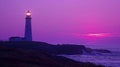 As the sky becomes a canvas of purples and pinks the lighthouses light becomes more prominent creating a mesmerizing