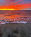 As sun rises in morning, a stunning sunrise is seen over ocean Royalty Free Stock Photo
