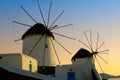 Mykonos windmills at evening, blending timeless charm with the beauty of the Aegean. Royalty Free Stock Photo