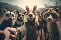 Hiker taking a selfie with a group of dogs in the mountains Royalty Free Stock Photo