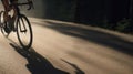 A cyclist speeds down a winding road on their road bike created with Generative AI