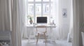 As you enter the workspace the Scandinavian simplicity is evident in the clean white desk and natural wood desk chair