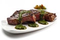 Asado, grilled beef with green chimichurri sauce on a white plate. AI generative