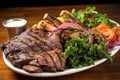 asado mixed grill with side of mixed greens