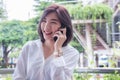 Asain girl`s smiling and using smart phone , happy time and taki Royalty Free Stock Photo