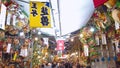 Tilt up video of the Ootori shrine during the Tori-no-Ichi Fair or Rakes Fair in november.