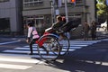 Asakusa rickshaw with a tourist and the puller Royalty Free Stock Photo