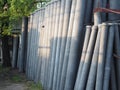 Asbestos Cement Pipes placed in vertical position. Royalty Free Stock Photo