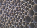 Asbestos cement pipes used for drainage construction. Texture for background. Royalty Free Stock Photo