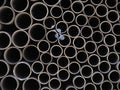 Asbestos cement pipes used for drainage construction. Texture for background. Royalty Free Stock Photo