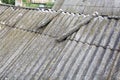 Asbestos old dangerous roof tiles. Royalty Free Stock Photo