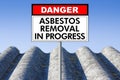 Asbestos Removal concept - Hazard Management with old roof and placard